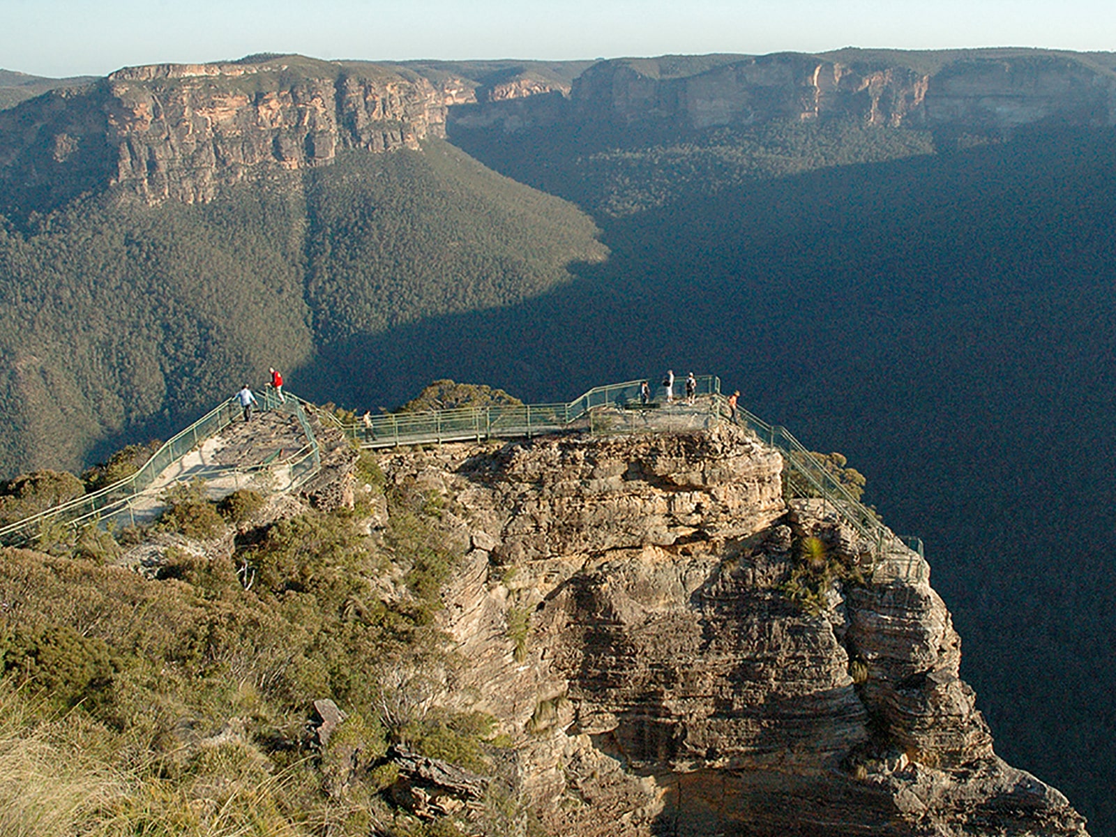 A stunning view from Pulpit Rock, Blackheath, with expansive vistas of the Blue Mountains and rugged cliffs.