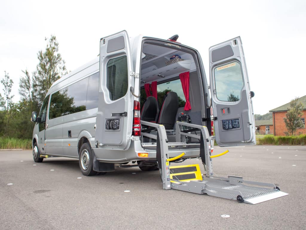 Sprinter Travel bus wheelchair lift fitted, full bus image.