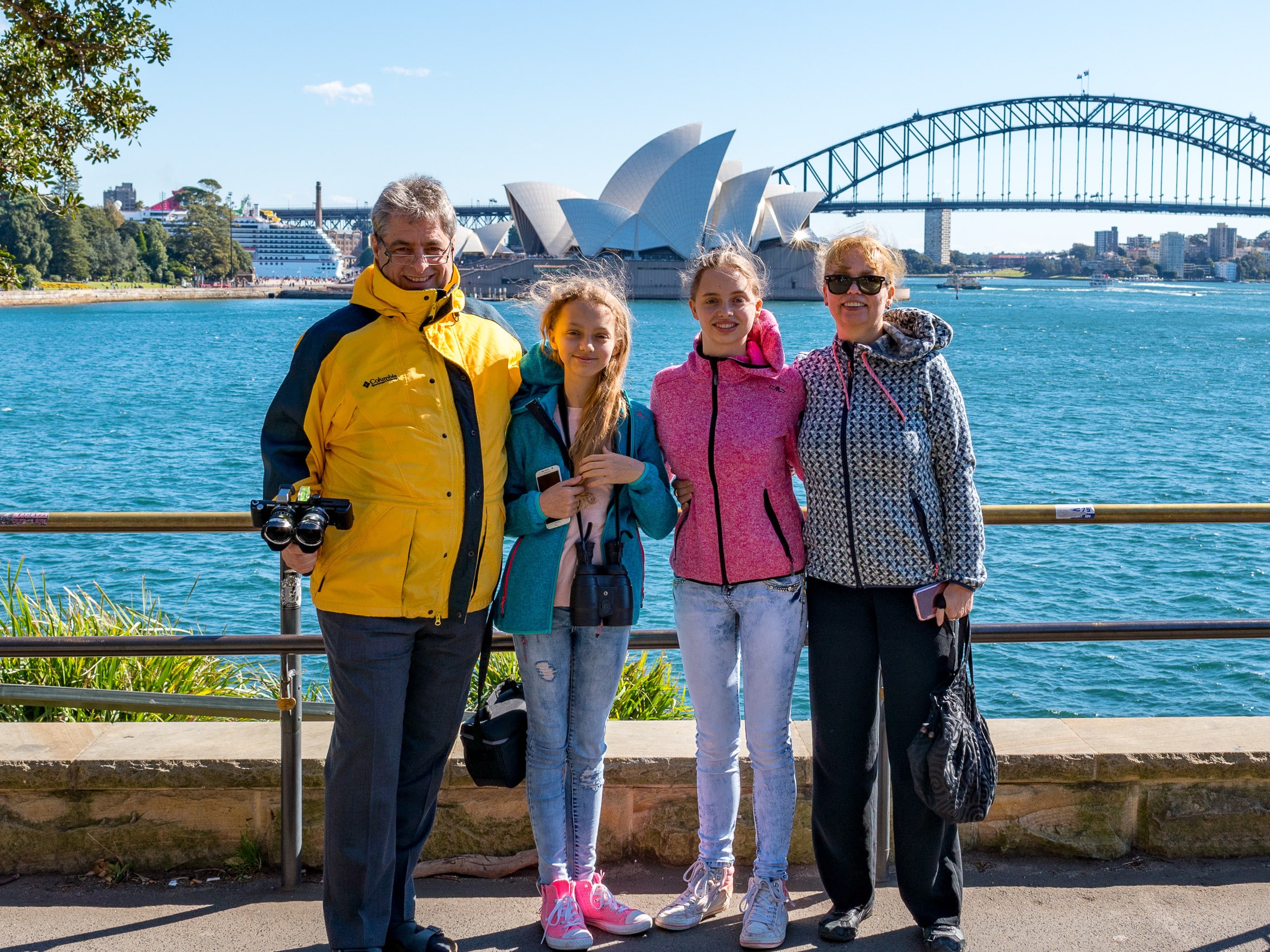 At Lady Macquarie's Chair, a family standing at the lower lookout